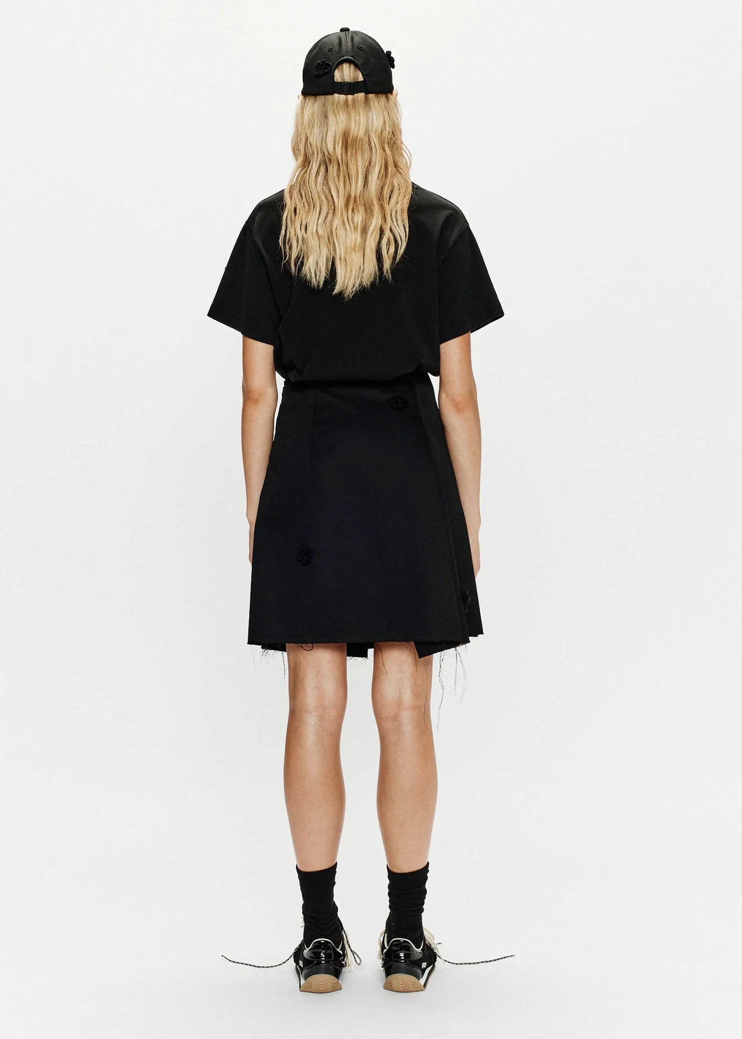 Black Pleated Daisy Mini Skirt